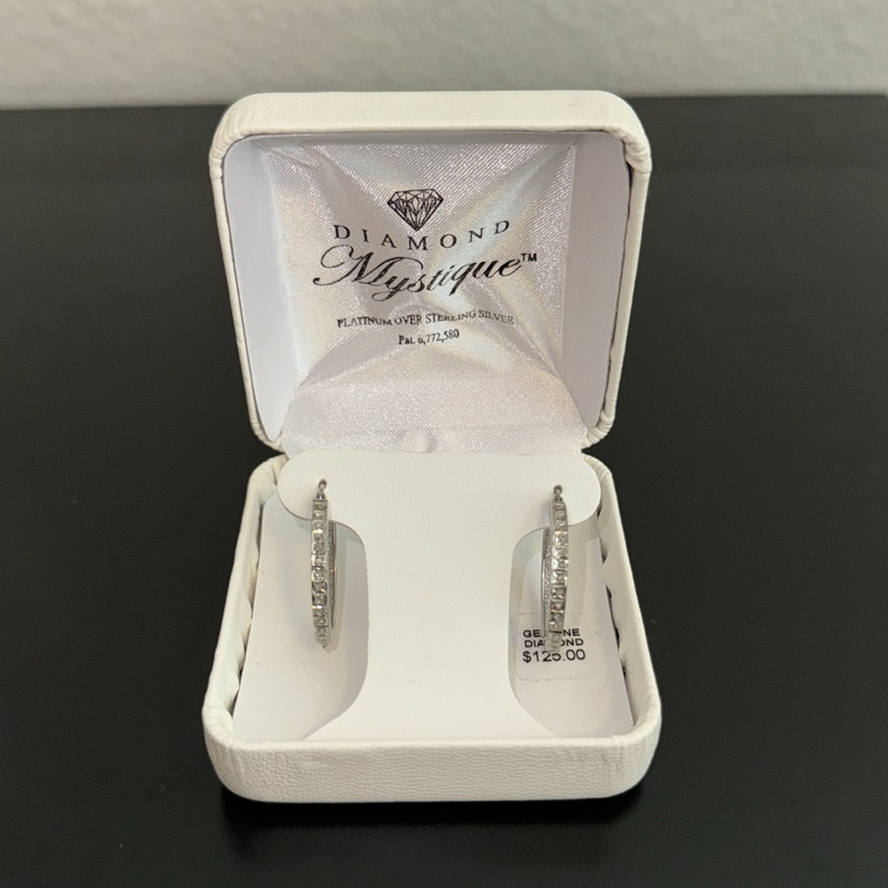 Genuine Diamond Silver Hoop Earrings. Brand new condition with tag.